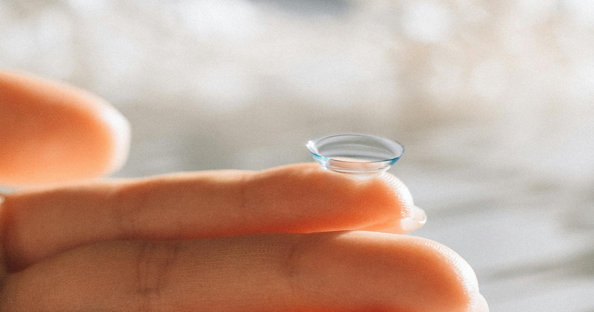 Contact lens on fingertip